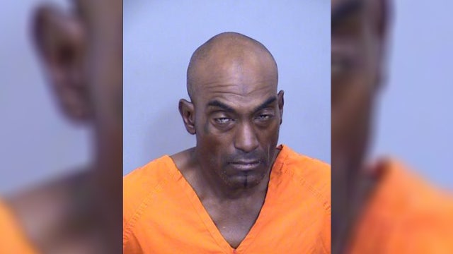 Man arrested in woman's stabbing death