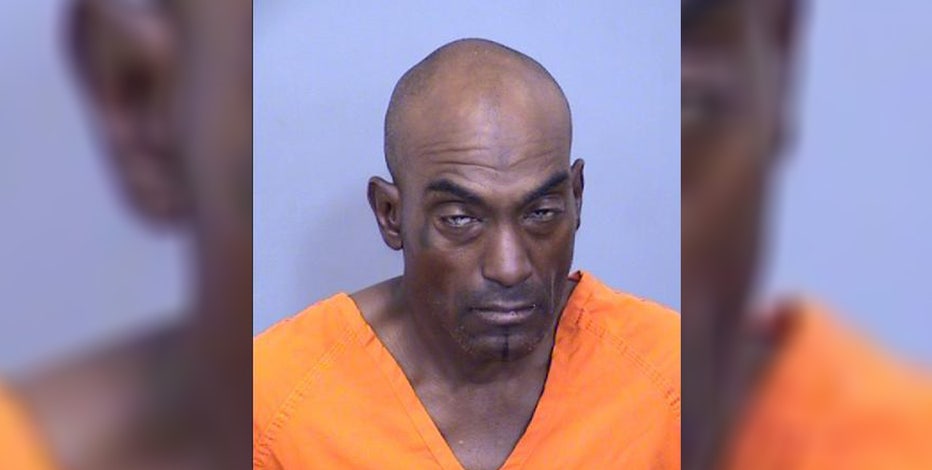 Man arrested in woman's stabbing death