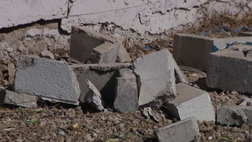 Rollover crash ends in the yard of a Phoenix home