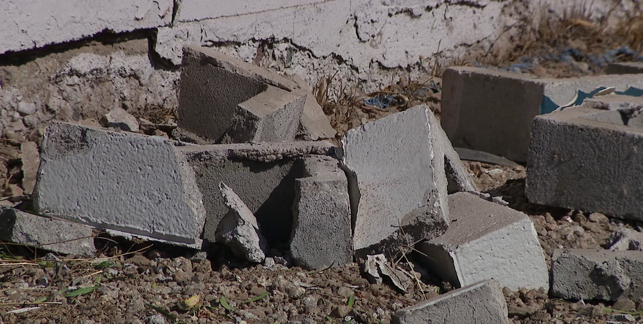 Rollover crash ends in the yard of a Phoenix home