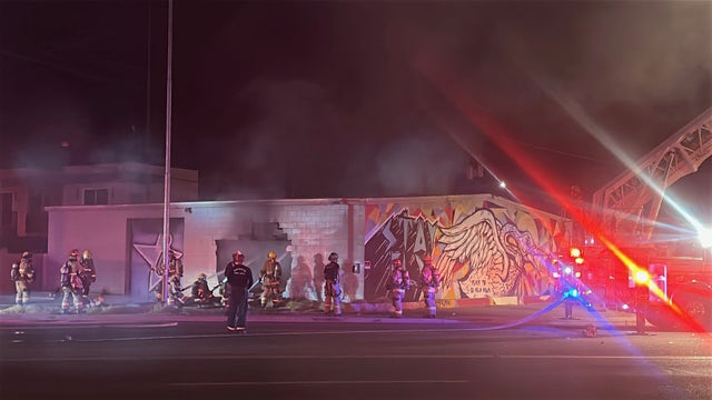 Driver killed after car crashes into central Phoenix building, bursts in flames