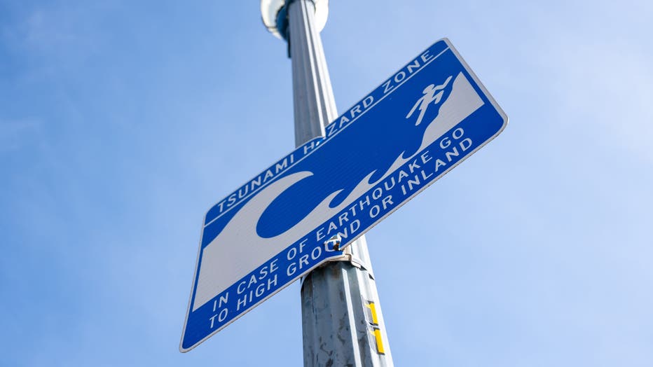 A tsunami hazard zone sign. (Photo by Smith Collection/Gado/Getty Images)