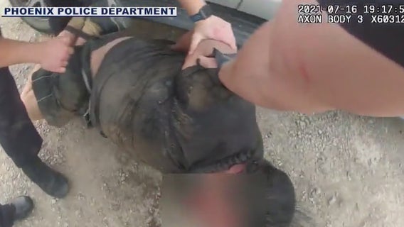 Body camera footage shows now former Phoenix Police officer beating man