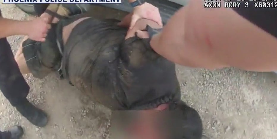 Body camera footage shows now former Phoenix Police officer beating man