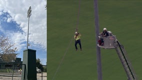 Worker rescued from top of light pole at Hohokam Stadium