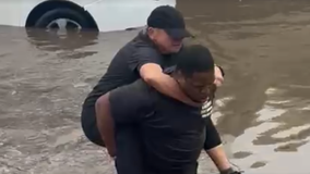 Man steps in to save stranded drivers from floodwaters