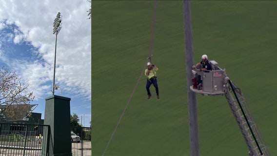 Worker rescued from top of light pole at Hohokam Stadium