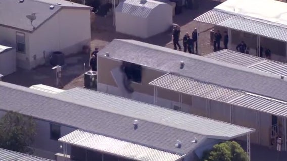 Woman critically injured in Peoria mobile home fire