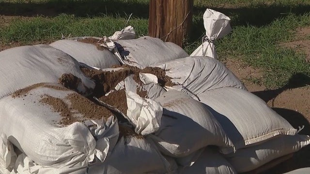 Flood-weary Globe, Miami residents brace for more rain