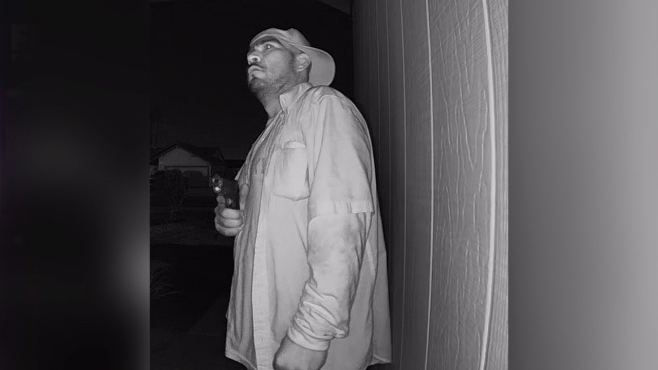 Caught on cam: Man points gun at Phoenix couple's door