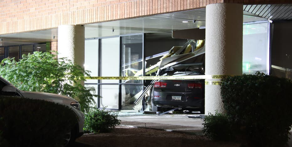 Father charged after 13-year-old daughter drives car into Mesa law office: police