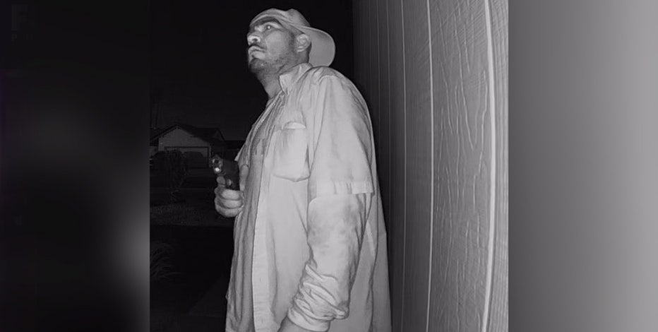 Caught on cam: Man points gun at Phoenix couple's door