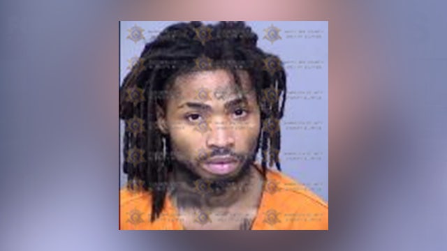 Phoenix officers shoot man who fired shots from behind wall, police say