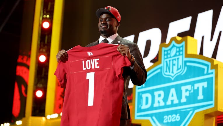 Jeremiyah Love of Notre Dame celebrates after being selected third overall pick by the Arizona Cardinals during Round One of the 2026 NFL Draft.