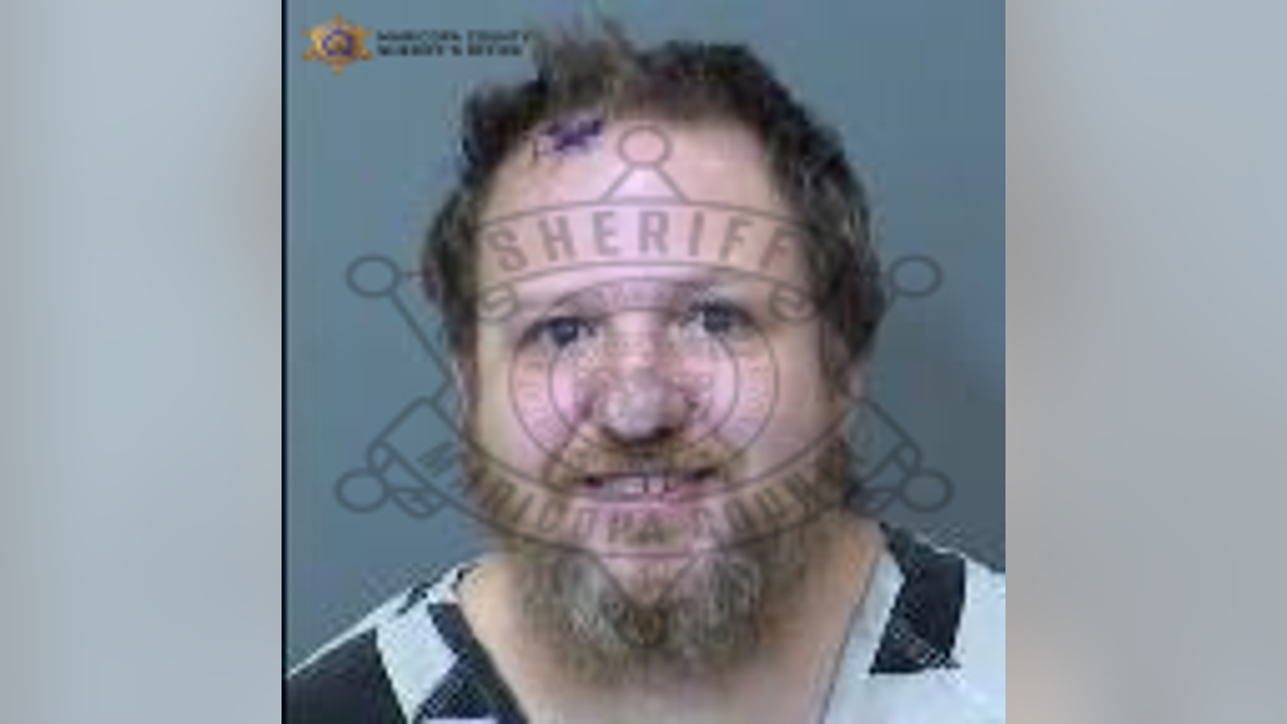 Man accused of threatening Mesa neighbor with crossbow
