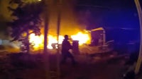 Mesa officers hospitalized after house fire