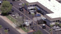 Mesa woman accused of threatening motel guests with knife, assaulting firefighter