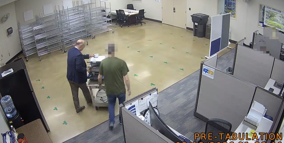Video shows Maricopa County employee removing ballot scanner from 'secure' site