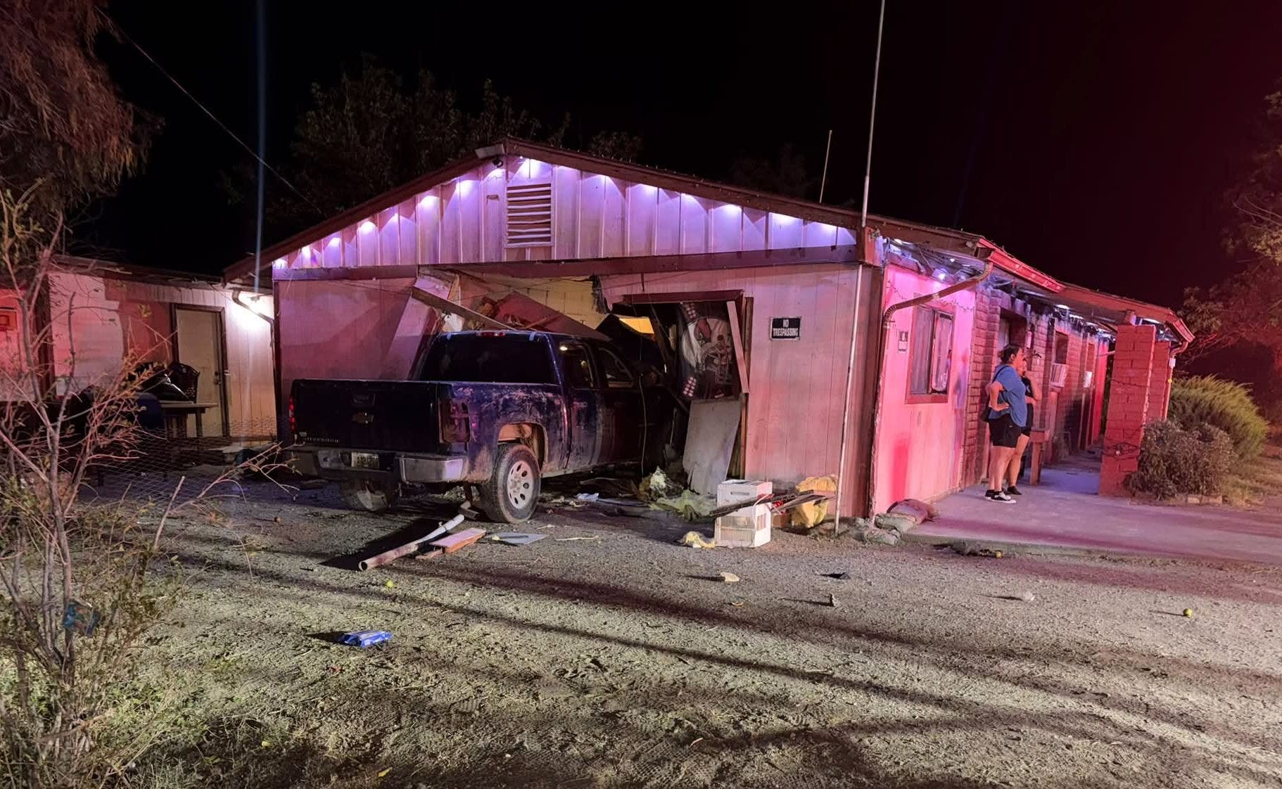 Truck plows into Arizona home, injuring resident after separate 'serious' crash minutes earlier