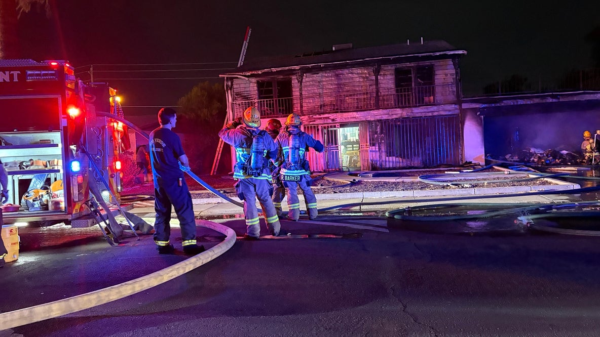 Woman rescued from burning Phoenix home