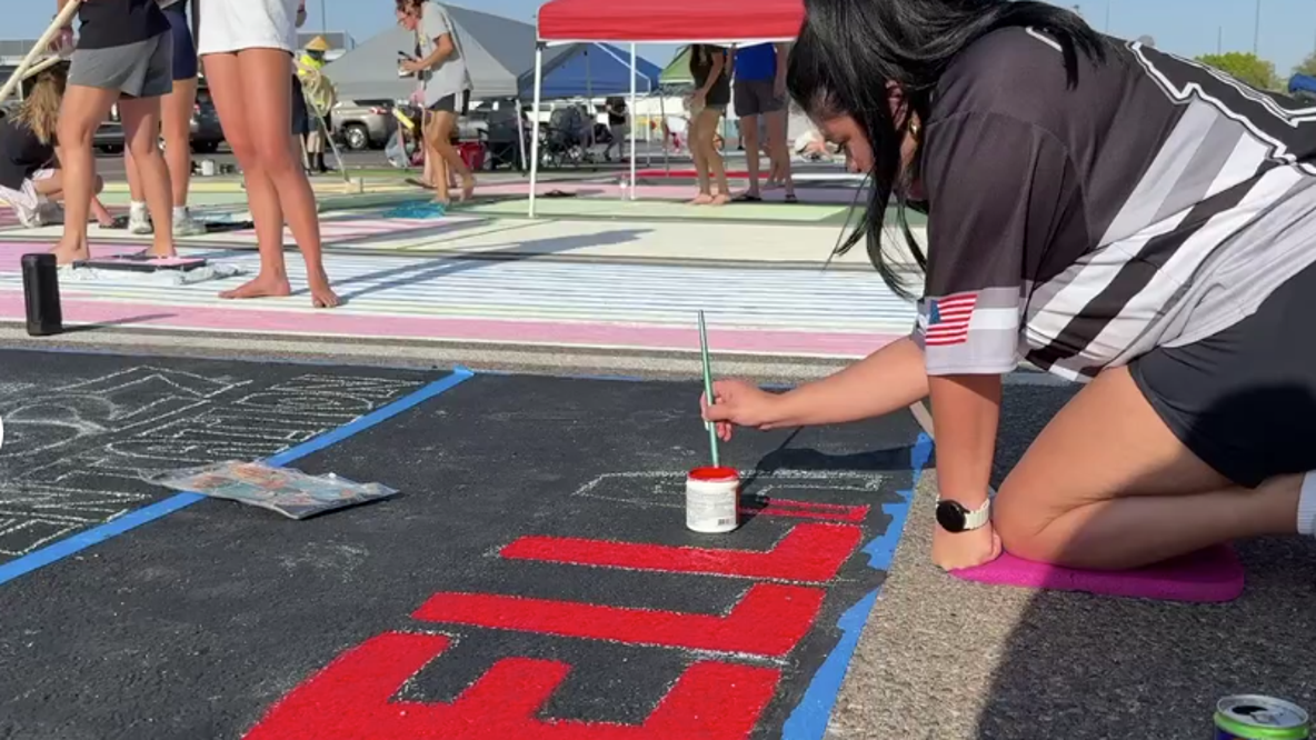 Gilbert seniors paint personal parking spots for annual tradition