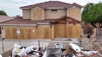 Who pays for property damage after a Glendale police standoff?