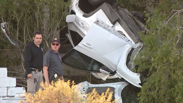 Woman dies after rollover crash into brick wall in Phoenix