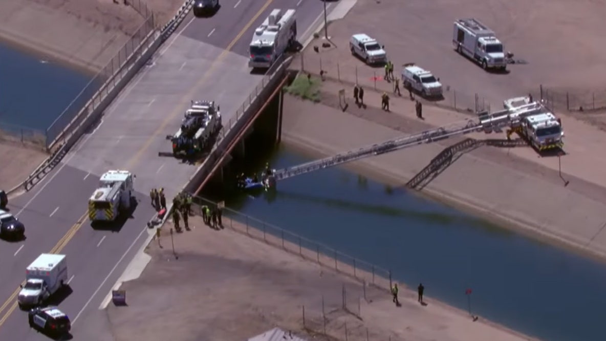 Crews working to pull vehicle from Mesa canal