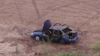 Body found inside burned car in Gilbert dirt lot