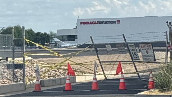 Street racing suspect rams Scottsdale Airport gate, hits small airplane, police say