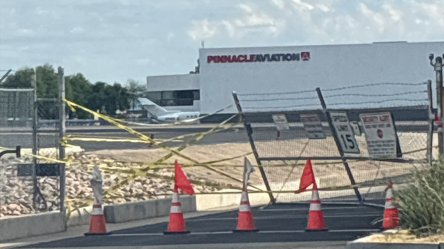 Street racing suspect rams Scottsdale Airport gate, hits small airplane, police say