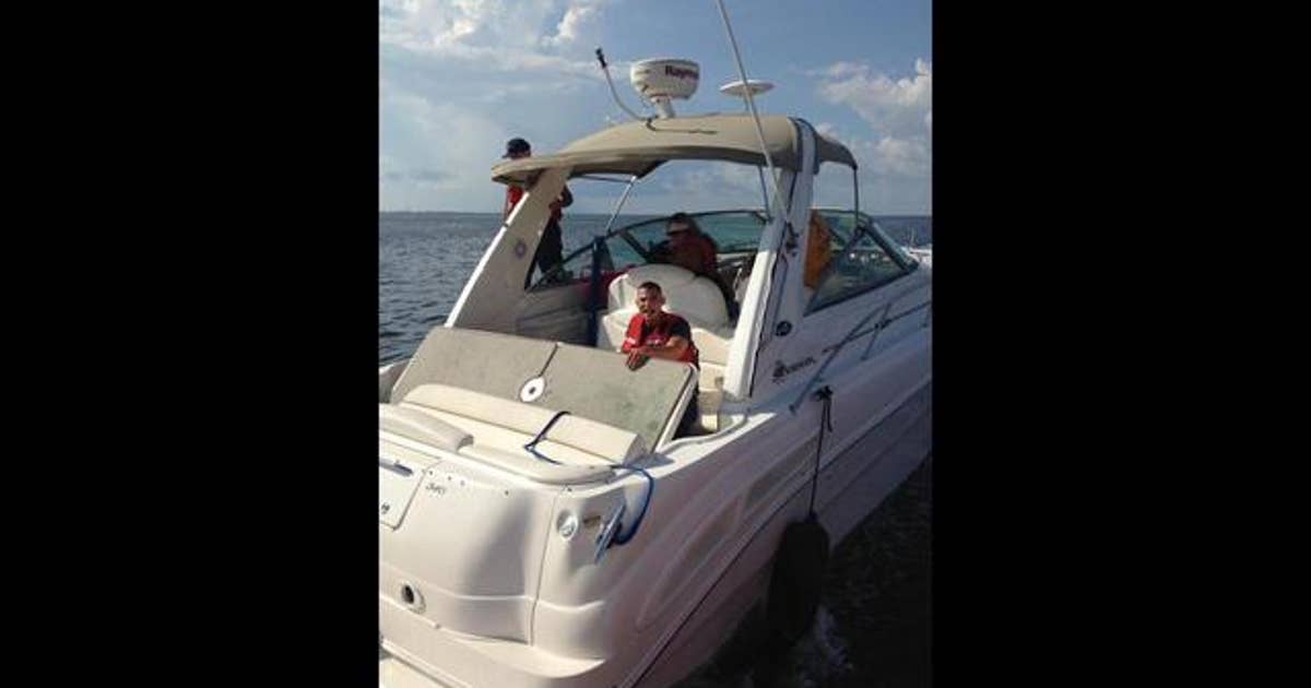 Couple and two dogs rescued after boat takes on water | FOX 13 Tampa Bay