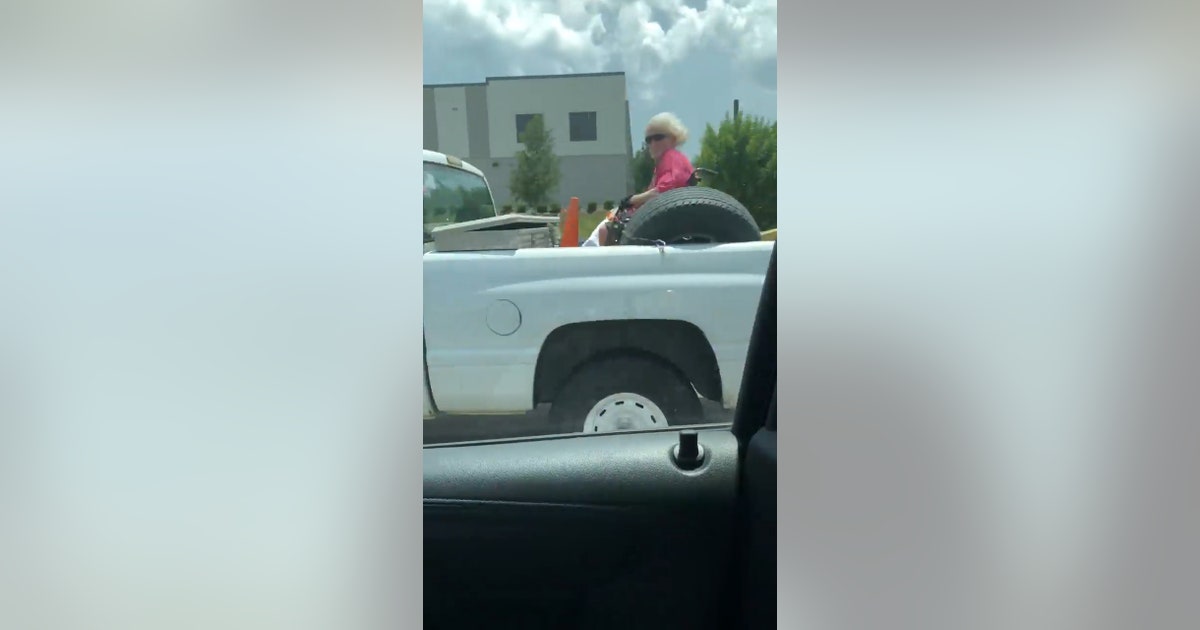 Woman in wheelchair rides in back of pickup truck through Tampa | FOX ...