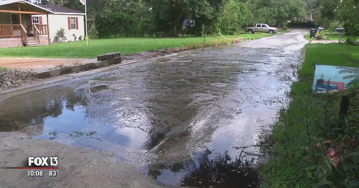 Yards, road flooding near condo construction site in Tampa | FOX 13 ...