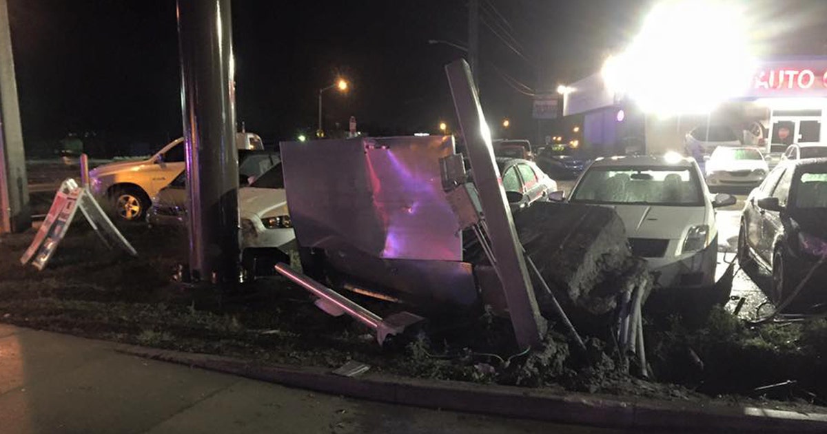 Traffic lights out after car slams into light pole | FOX 13 Tampa Bay