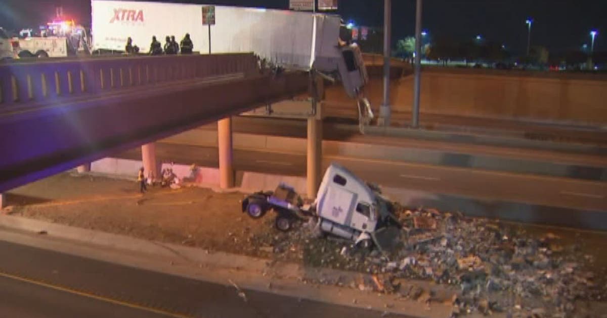 Semi crash left trailer dangling on Texas overpass | FOX 13 Tampa Bay