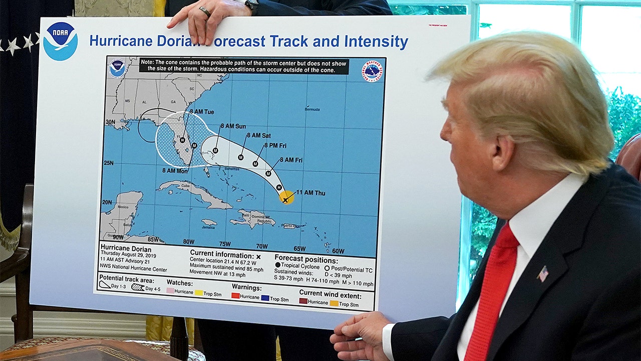 Trump shows apparently altered Hurricane Dorian forecast with hand 