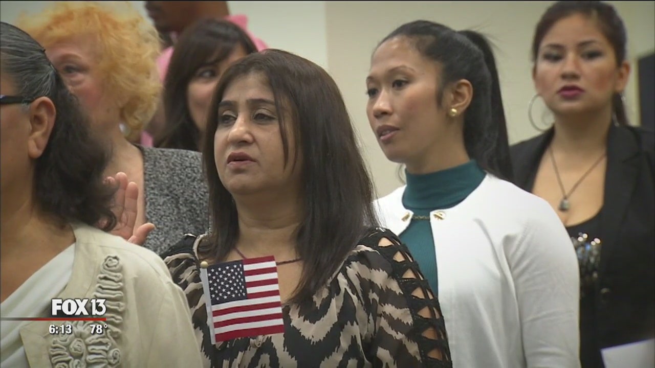 75 women take U. S. Oath of Allegiance, become citizens together