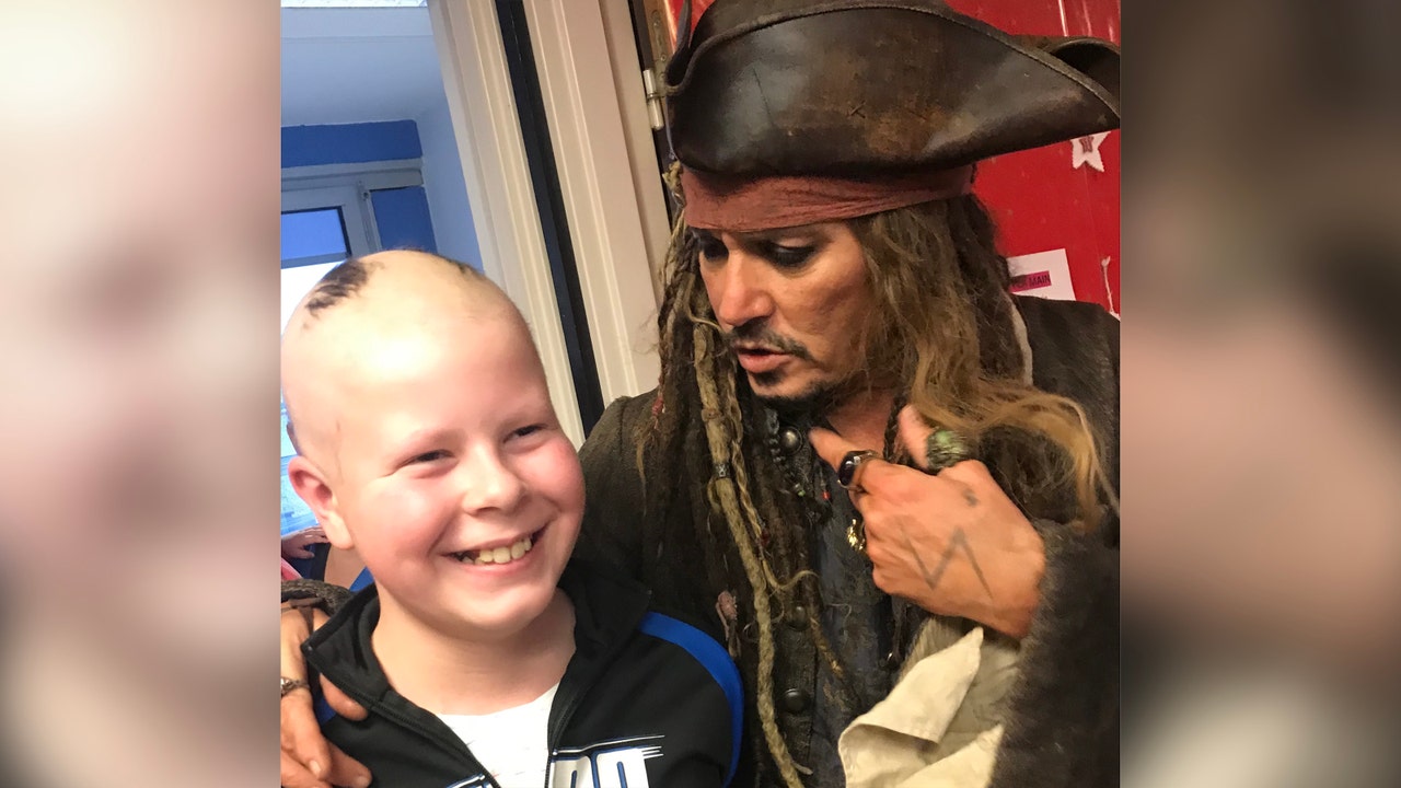 Johnny Depp visits pediatric patients as Jack Sparrow at Paris hospital