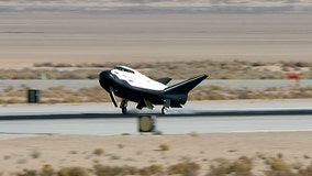 Mini-shuttle glides to safe landing in desert test flight