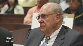 Defendant's son recalls movie theater shooting as hearing opens