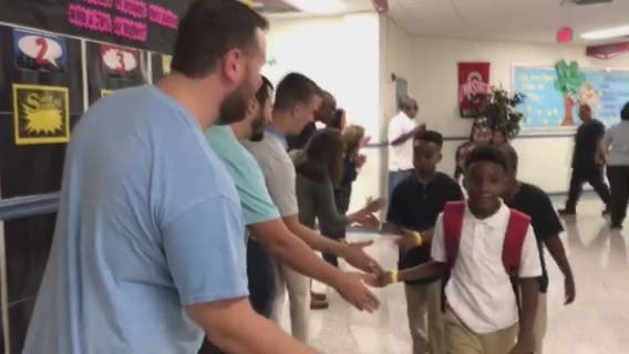 Broward Elementary students greeted by dads on first day of school