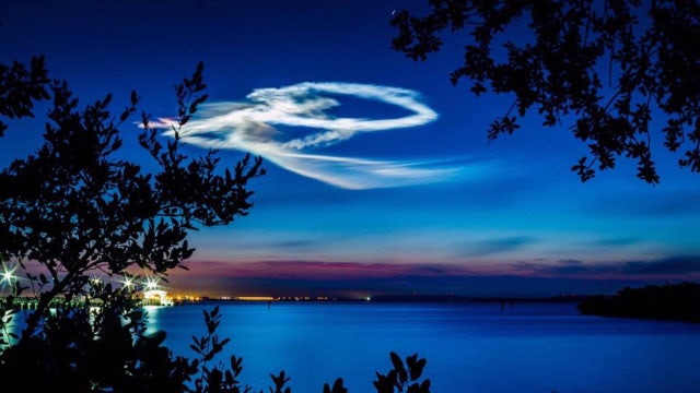 Pre-dawn satellite launch puts on stunning show in sky