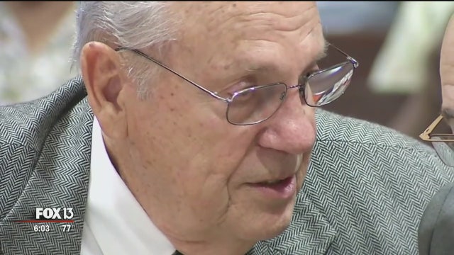 Defense says thrown cell phone prompted theater shooting