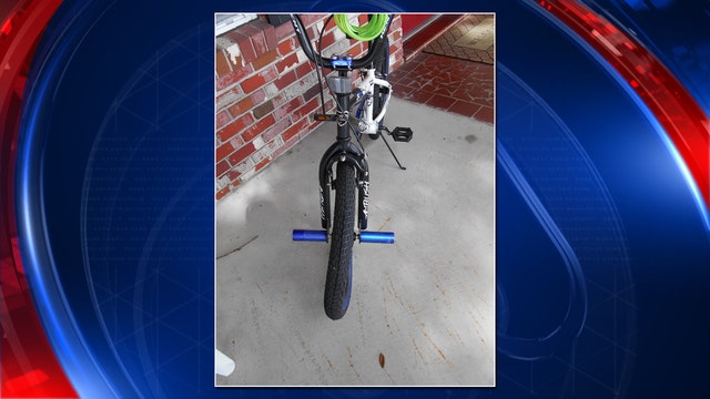 Cops: Woman collides with child on bike, hands over $20