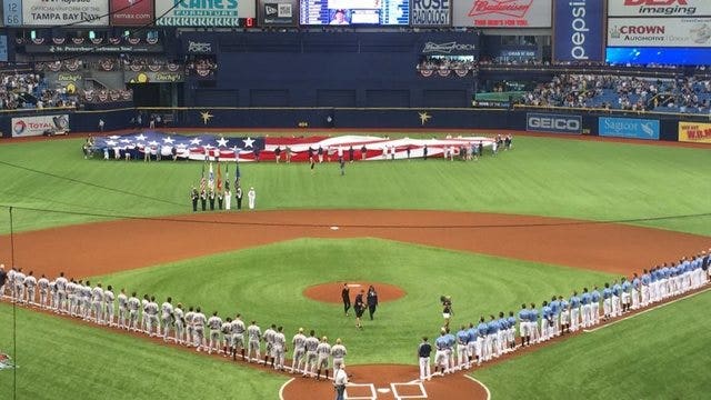 Archer outpitches Tanaka, Rays top Yankees 7-3 in MLB opener