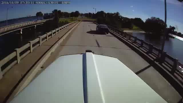CAUGHT ON CAMERA: Car narrowly misses two pedestrians