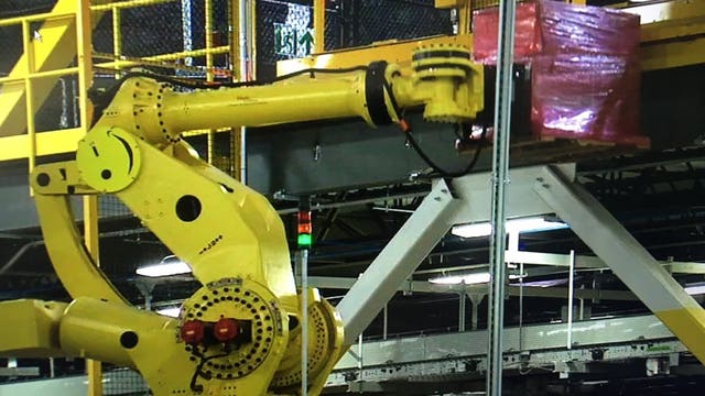 People, robots work together at Amazon's Lakeland facility