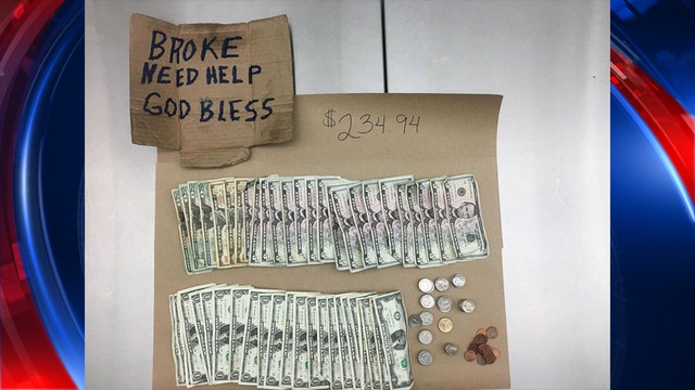 Police photo of panhandler's sign, money sparks online controversy