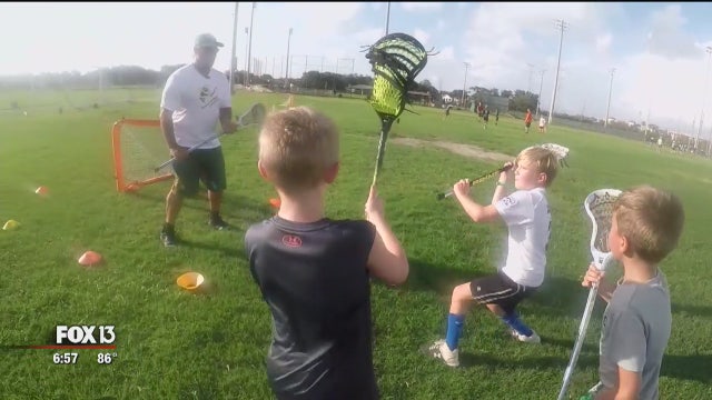 Clearwater kids get lessons in lacrosse